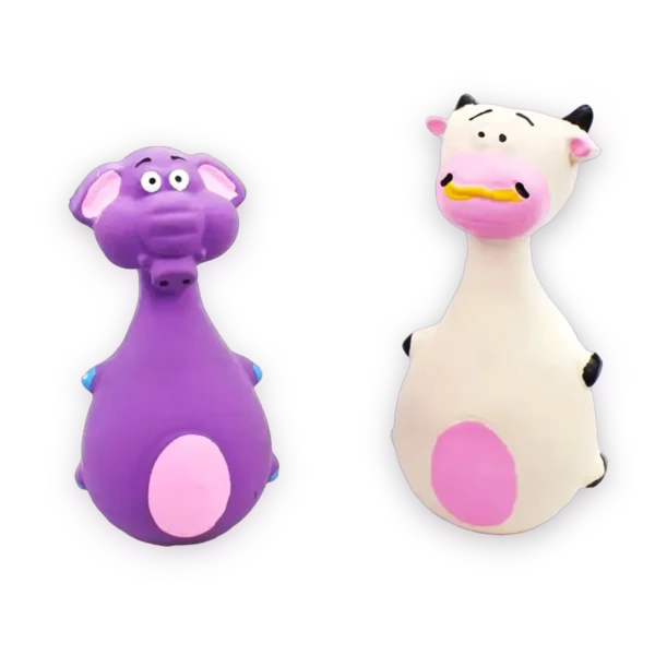 A white squeaky cow made by latex toy for dogs